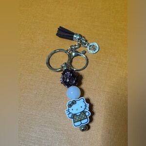 Charming Hello Kitty Keychain with Floral Accent